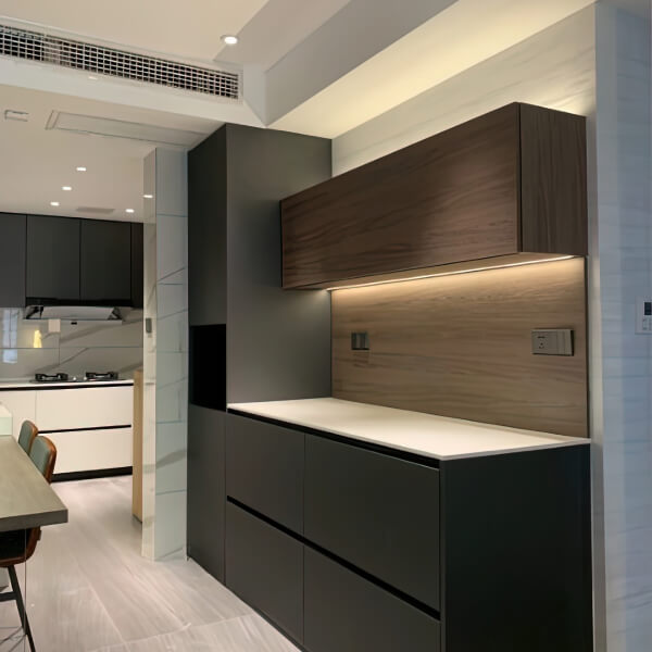 Modern kitchen with wooden countertops and black cabinets, showcasing high-end design