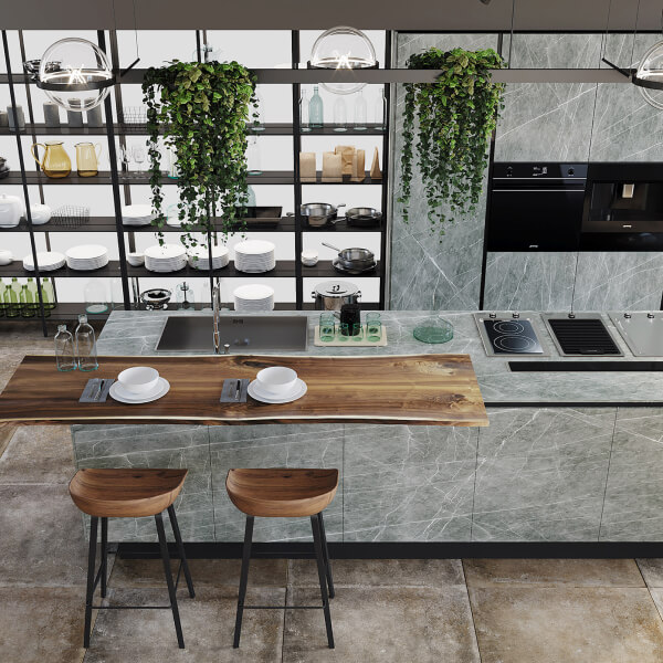 Cuisine moderne avec un comptoir en marbre et des plantes vertes, après rénovation. 